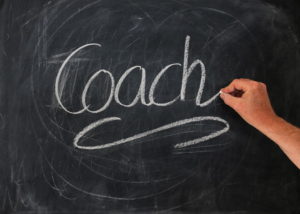 Coach on chalkboard
